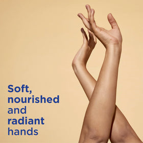 Close-up of Vaseline Radiant X hand butter texture with microdroplets