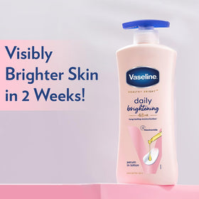 Vaseline Healthy Bright lotion on hand showing quick hydration.