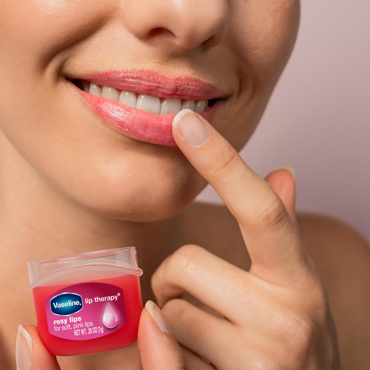 Vaseline Lip Therapy Rosy Lips mini-packaging side view highlights compact travel size.