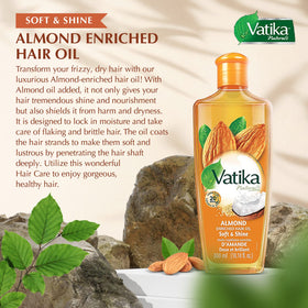 Vatika Naturals Dabur Hair Oil coconut application for strengthened strands and fuller look.