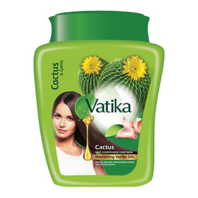 Vatika Naturals hot oil hair mask applied to damp hair for deep conditioning.