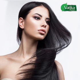 Vatika Naturals Olive Enriched Hair Oil bottle close-up highlights nourishing formula