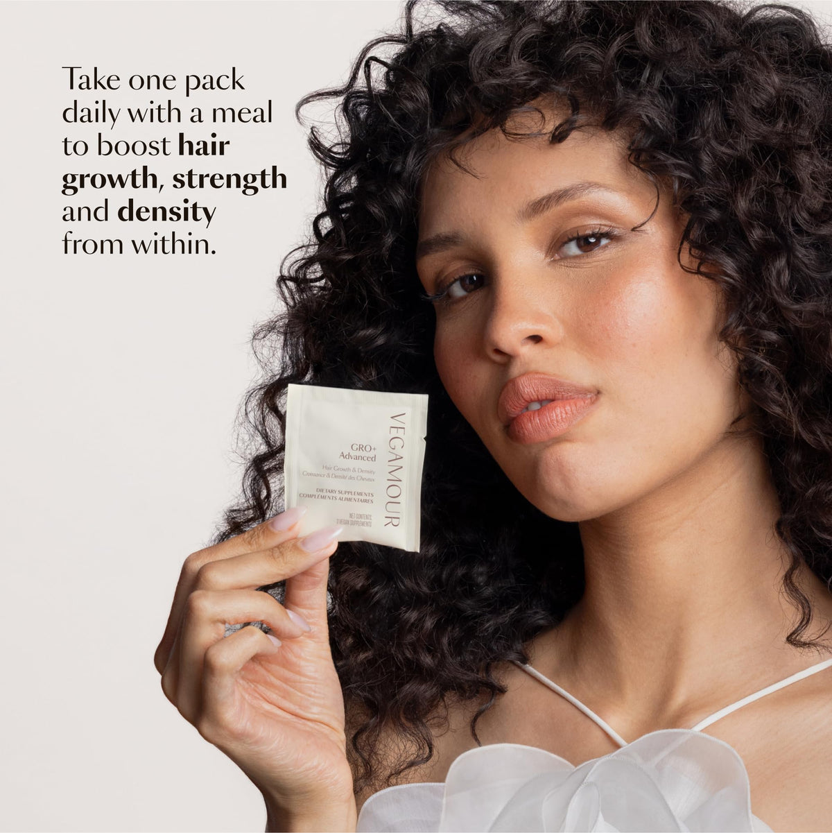 VEGAMOUR GRO+ glossy packaging highlighting premium formulation.