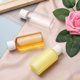 VEIDIA mini flip-top containers designed for TSA-friendly travel sizes.