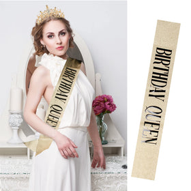 VELSCRUN Gold-plated crystal tiara gleams in a celebratory look.