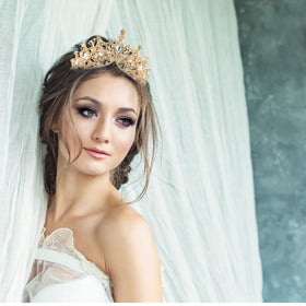 VELSCRUN Tiara closeup showing rhinestones and a diamond-like setting.
