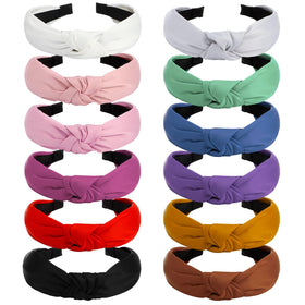 VELSCRUN satin headbands knotted in black and white for comfortable everyday wear.