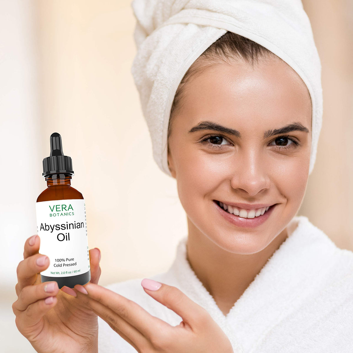 Vera Botanics Abyssinian Oil being massaged into scalp.