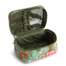 Interior pockets and brush loops in Vera Bradley cosmetic case for tidy on-the-go use.