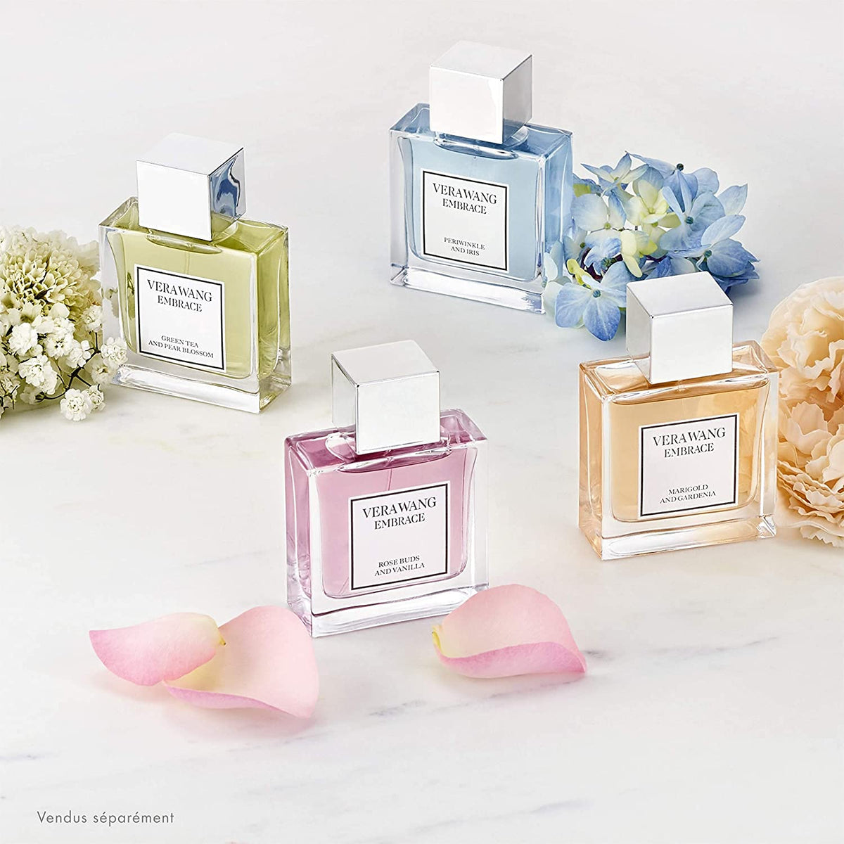 Vera Wang Embrace Periwinkle Iris packaging and bottle on a soft surface.