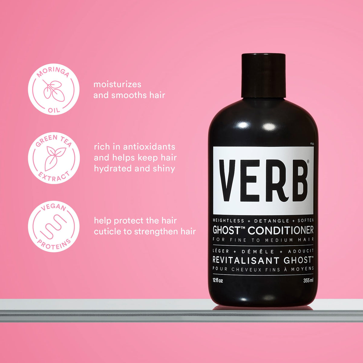 VERB Ghost Shampoo bottle shown during a gentle scalp massage for cleansing