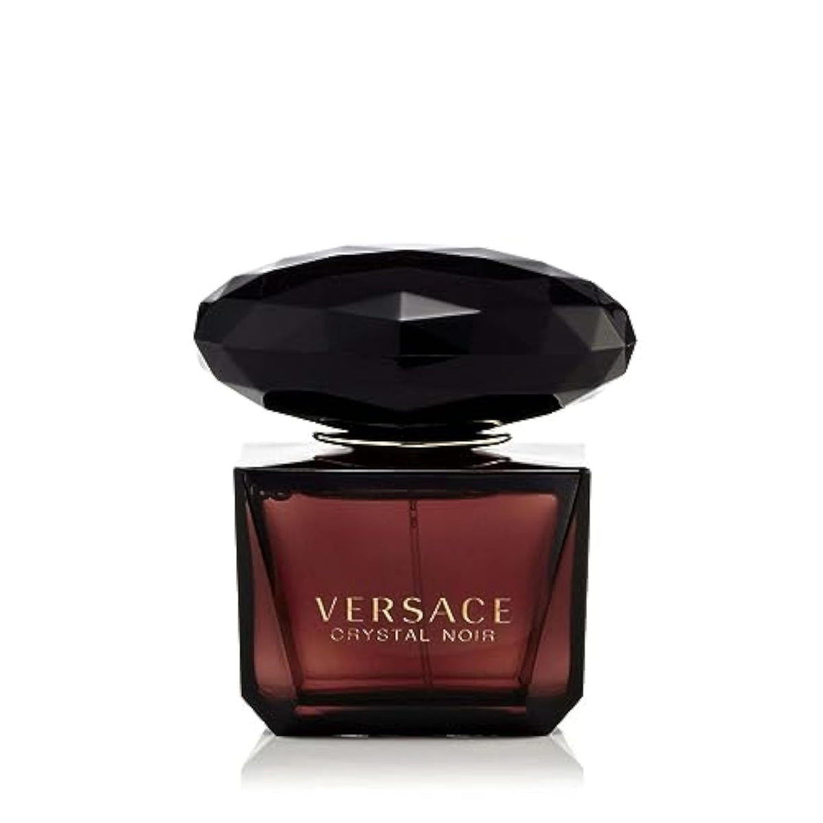 Versace Crystal Noir bottle closeup showcases elegant design for a luxe evening.