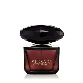Versace Crystal Noir bottle closeup showcases elegant design for a luxe evening.