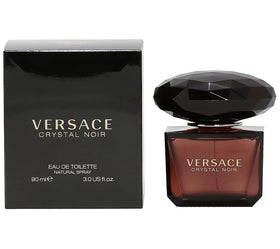 Versace Crystal Noir packaging on display highlights couture-inspired sophistication.