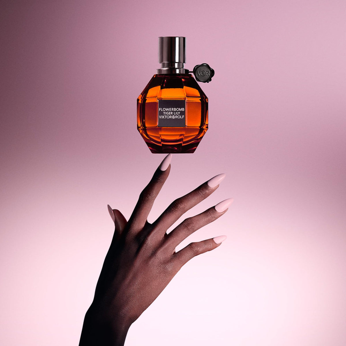 Tiger Lily EDP spray on wrist showing lasting glow and floriental vibe