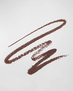 Victoria Beckham Satin Kajal Cocoa being applied along the lash line for precise definition.