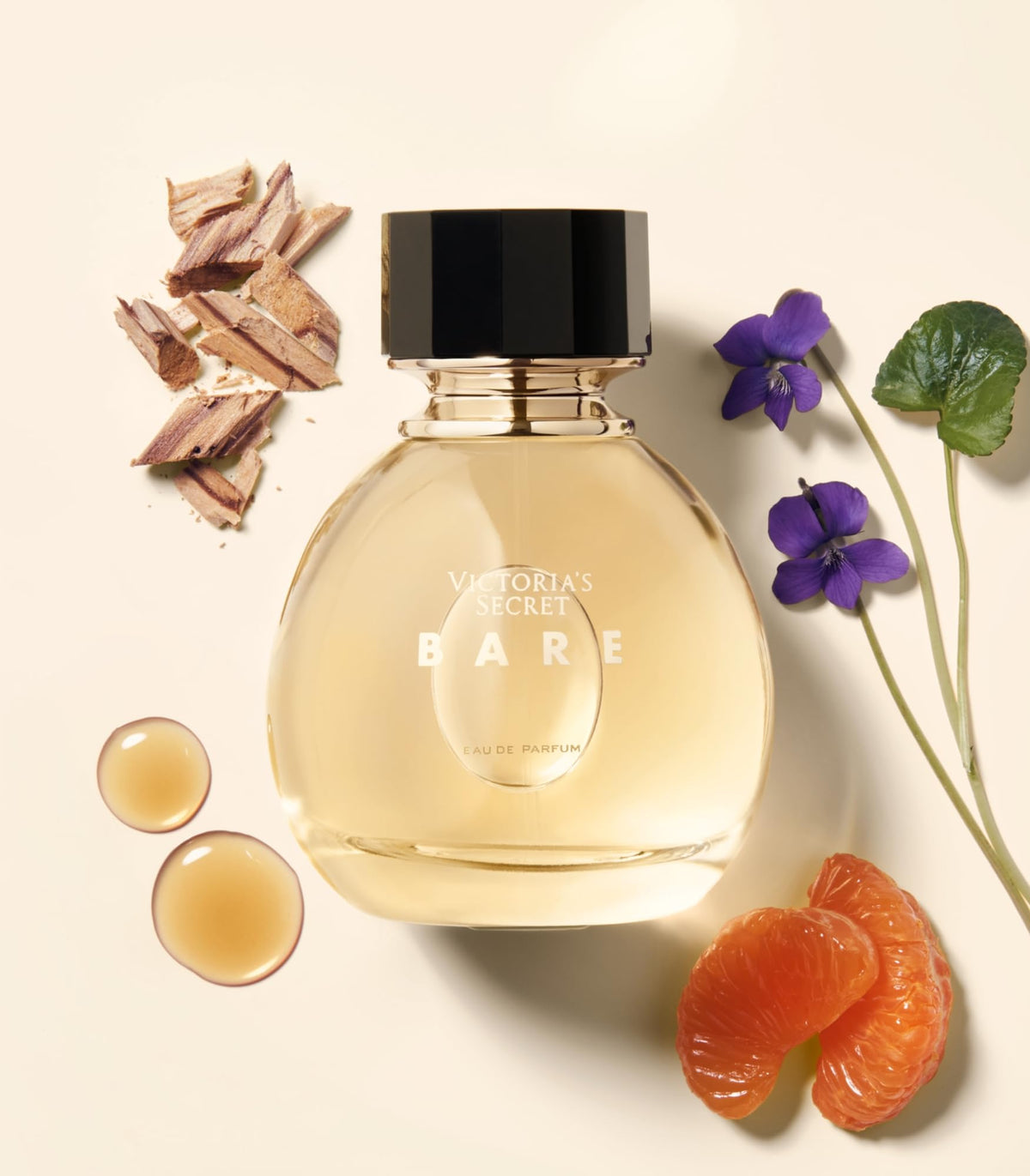 Victoria's Secret Bare EDP close-up captures sandalwood, mandarin, and violet notes.