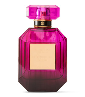 Victoria's Secret Bombshell Passion bottle closeup, luxury glass and sparkling notes.
