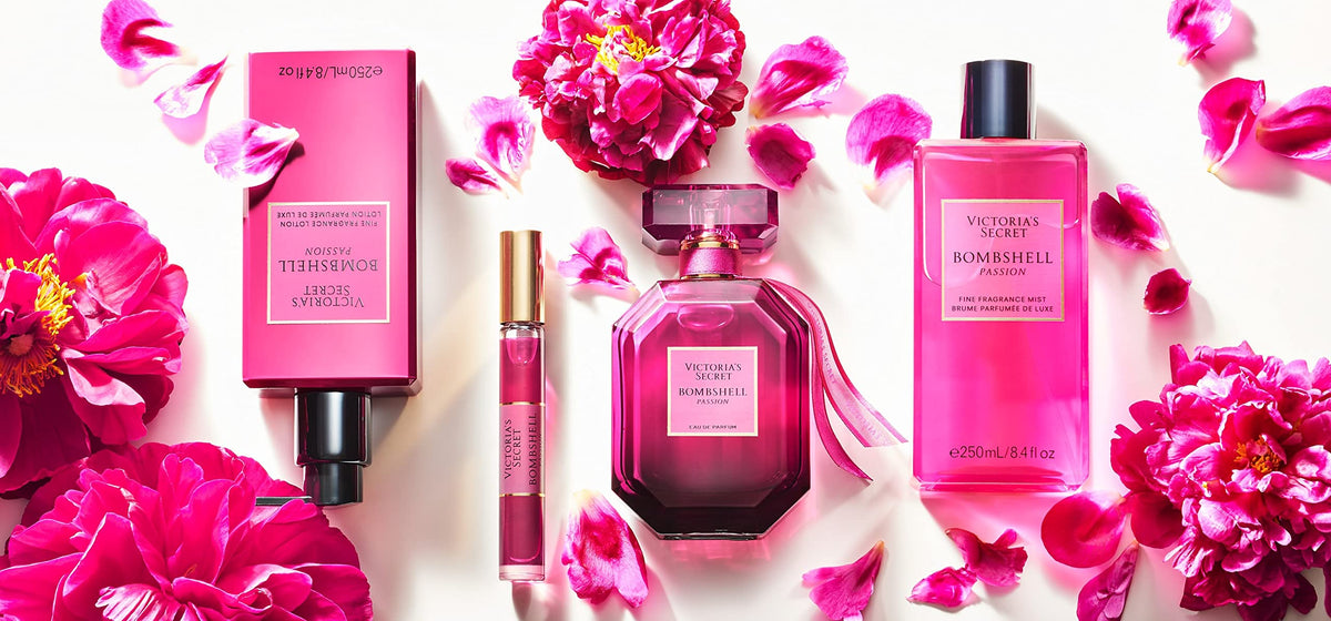Victoria's Secret Bombshell Passion gift set display with fragrance and accessories.