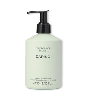 Victoria's Secret Daring body lotion bottle highlights amber-woody notes for daily fragrance.