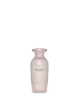 Day Dream spray application releasing a delicate mist for fresh diffusion.