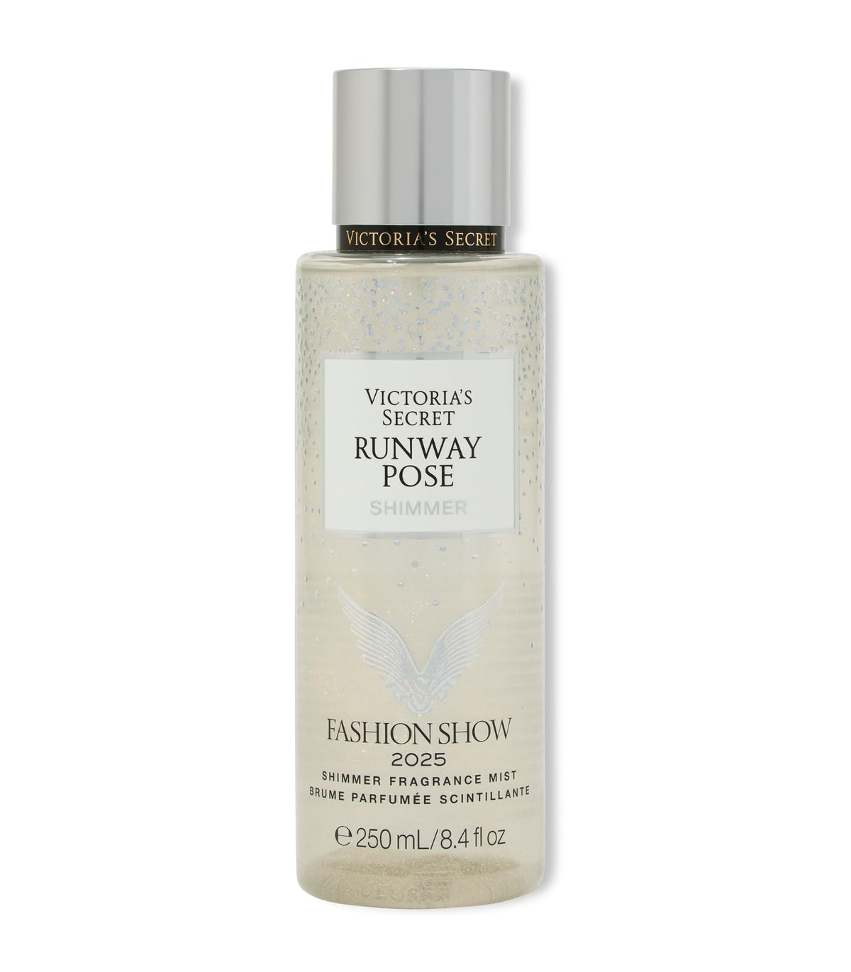 Victoria's Secret Fashion Show Runway Pose Shimmer Fragrance Mist bottle glowing under stage lights