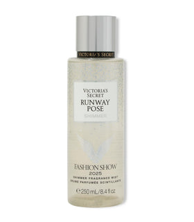 Victoria's Secret Fashion Show Runway Pose Shimmer Fragrance Mist bottle glowing under stage lights