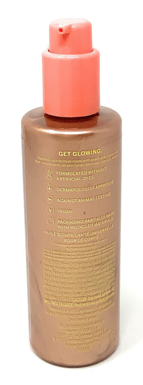 Victoria's Secret PINK Peach Highlighting Body Oil on skin for subtle shimmer