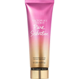 Victoria's Secret Pure Seduction lotion being applied for silky skin and scent.