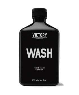 Victory Barber & Brand Beard Wash bottle pour for easy, one-handed application.