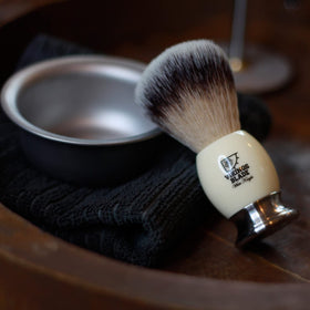 VIKINGS BLADE White Knight handle closeup highlights heavy acrylic and steel for luxury grip.