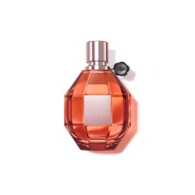 Viktor&Rolf Tiger Lily EDP bottle on vanity, a premium floral fragrance for special occasions.