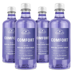 Village Naturals Therapy Comfort bath oil bottle front showing arnica and blueberry extracts for skin care