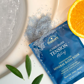 Village Naturals Therapy soft towel and bath ritual inviting gentle self‑care.