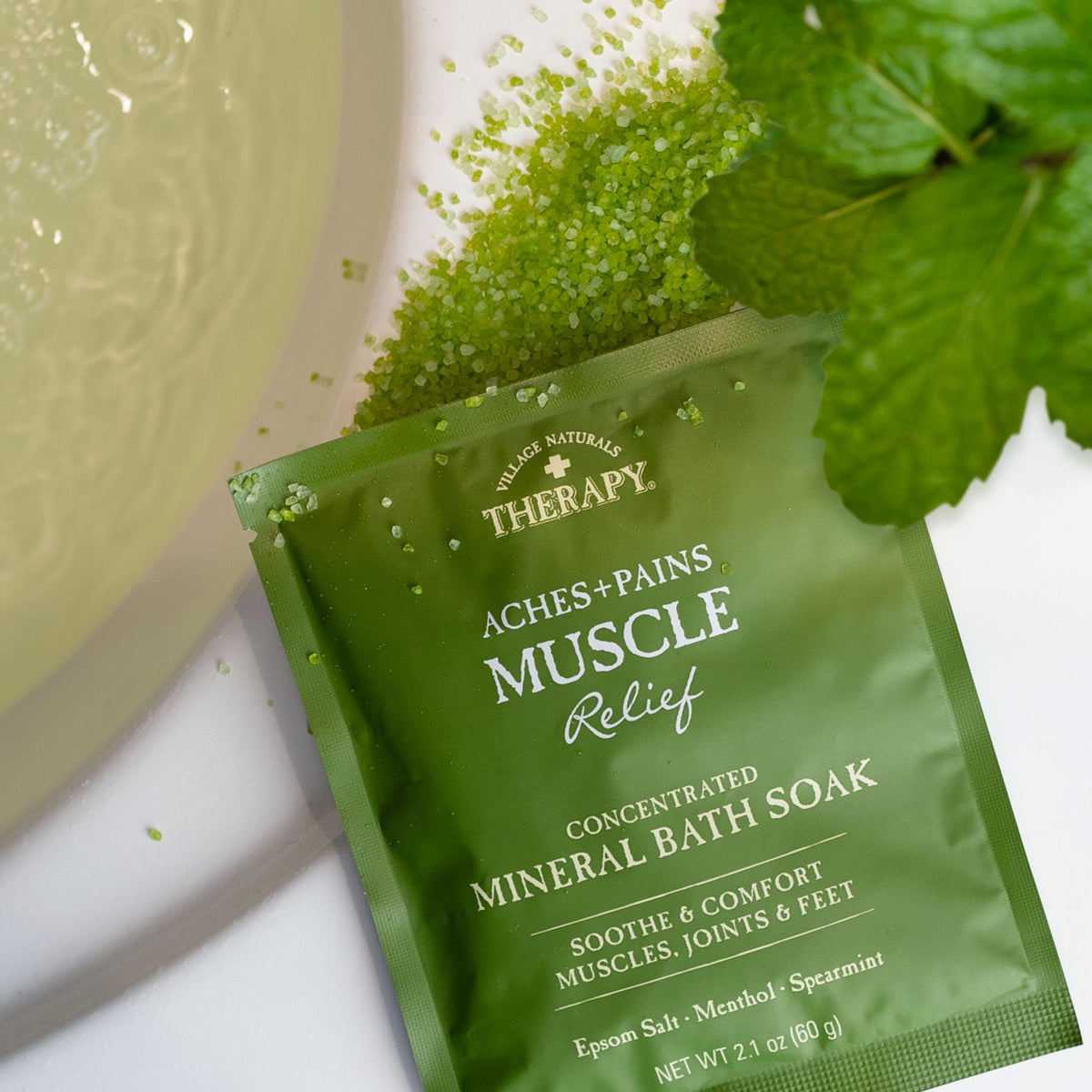 Gift-ready Village Naturals Therapy set tied with ribbon for gifting.