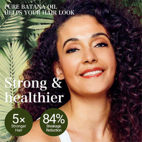 VIMOZA Batana Oil bottle closeup showing rich texture for scalp hydration