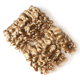 VIOLET dark-blonde curly bundle close-up showing tight, defined curls