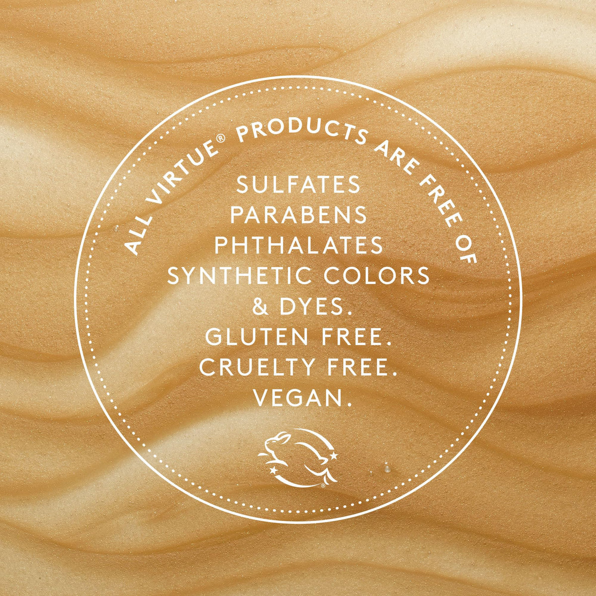 VIRTUE Frizz Block bottle on vanity emphasizes effortless styling and protection.