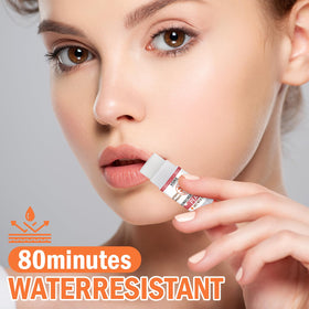 Applying VISRIE SPF 30 lip balm during outdoor sun exposure.