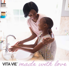 Vita Vie creamy lather in hand demonstrates easy rinse and gentle cleansing.