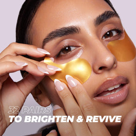 Vitamasques Golden Hydrogel Eye Pads in use under eyes for cooling relief.
