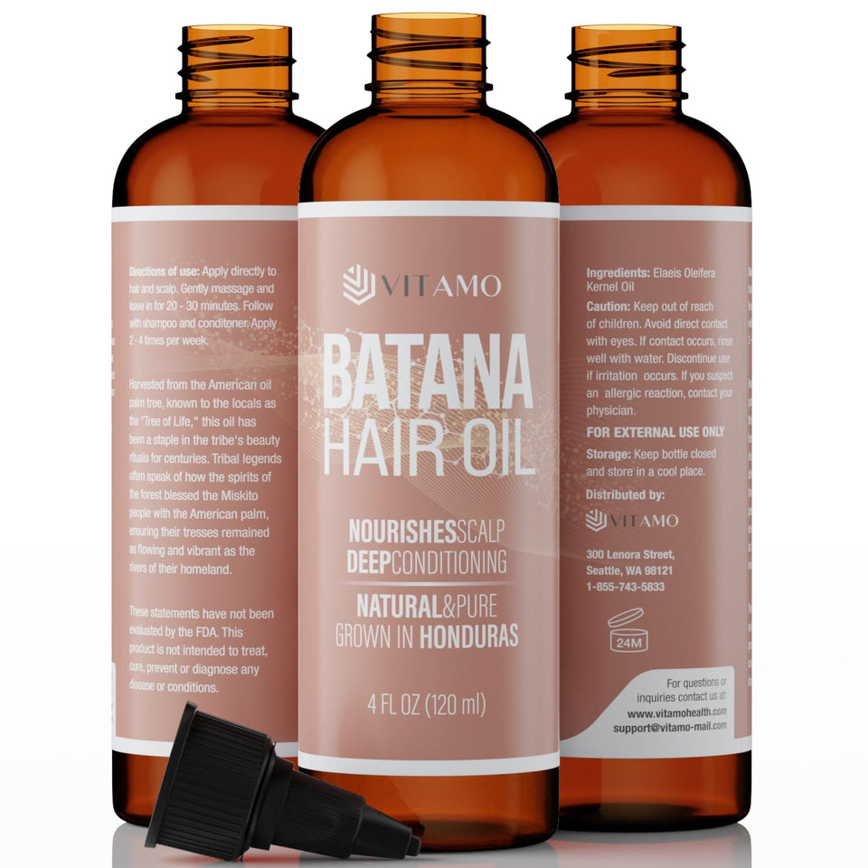 Vitamo Batana Oil bottle close-up highlighting premium cold-pressed formula for hydration.