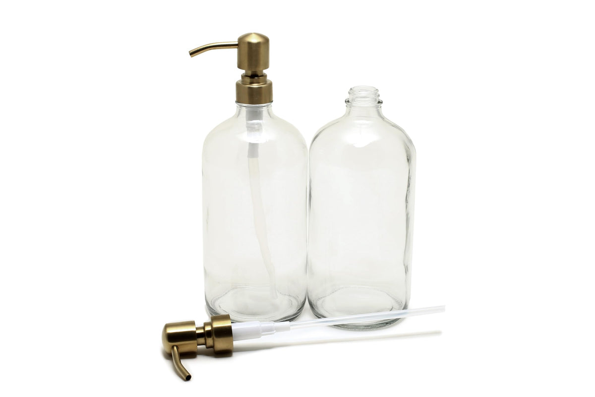 Vivaplex yellow gold stainless steel pump on a clear glass bottle for smooth dispensing.