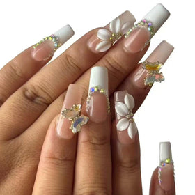 Vlazryk press-on nails with almond shape and 3D flowers and butterflies for a custom look.