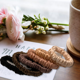 VLOMOT Nude silk scrunchie closeup blends with any hairstyle.