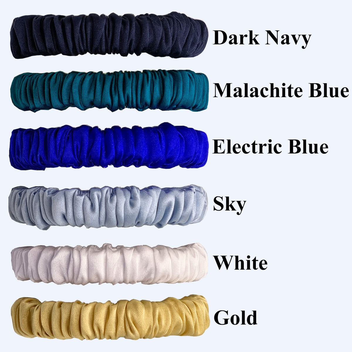 VLOMOT mulberry silk scrunchie in malachite blue protects hair and holds styles softly.