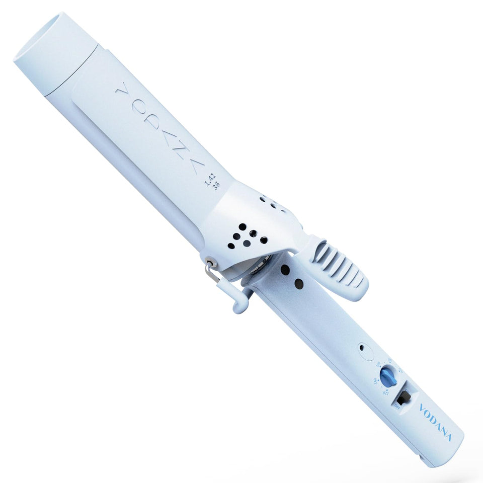 Vodana GlamWave ceramic curling iron with a 1.4-inch barrel for fast styling.