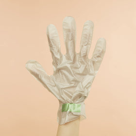 VOESH collagen gloves package close-up emphasizing vegan formula.