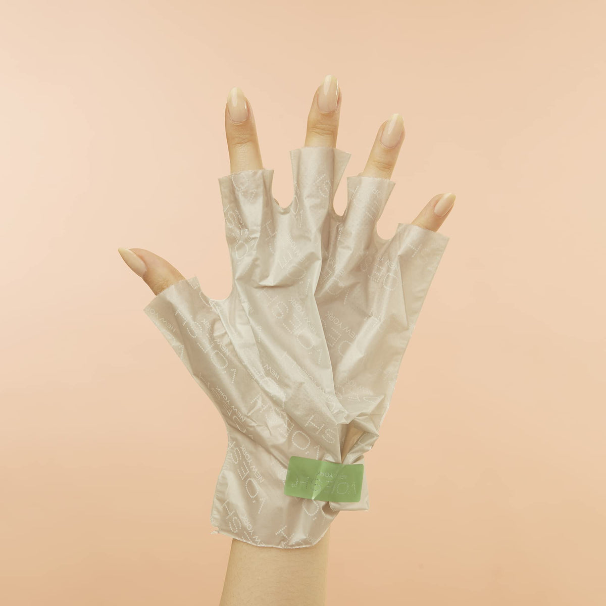 Texture of glove lotion visible on skin after removal.