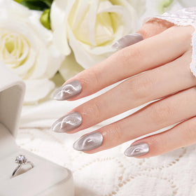 VSALON cat-eye swirl design nails ideal for quick chic upgrades.